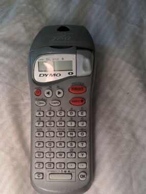 Dymo Handheld Label Maker in Light Gray with Red Buttons